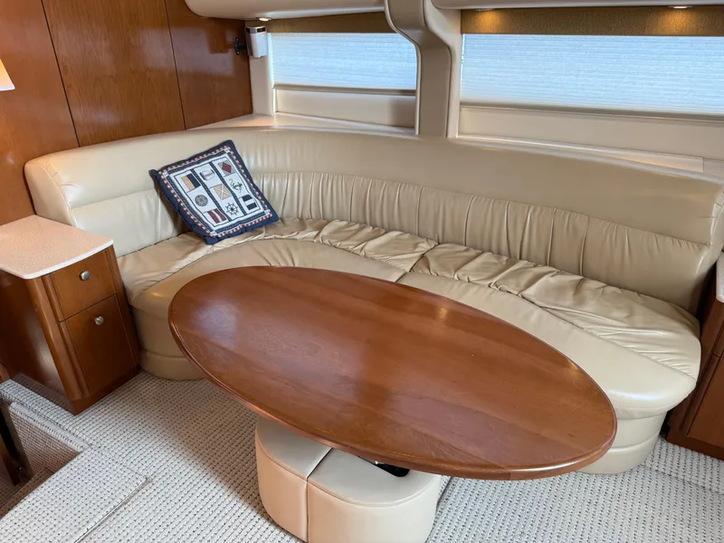 Slide: The Image of Luxurious interior of 2005 Meridian 459 Motoryacht with leather seating and wooden table. - 29