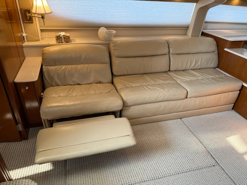 Slide: The Image of Luxurious beige leather sofa in 2005 Meridian 459 Motoryacht interior. - 31