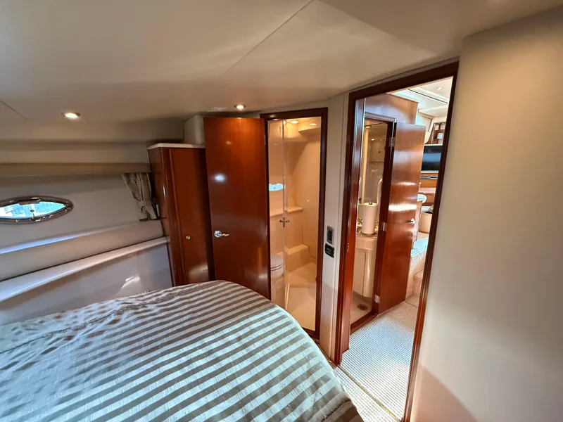 Slide: The Image of Interior of 2005 Meridian 459 Motoryacht bedroom with ensuite bathroom. - 42