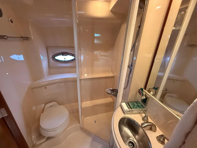 Slide: The Image of Bathroom interior of 2005 Meridian 459 Motoryacht with shower, sink, and toilet. - 46