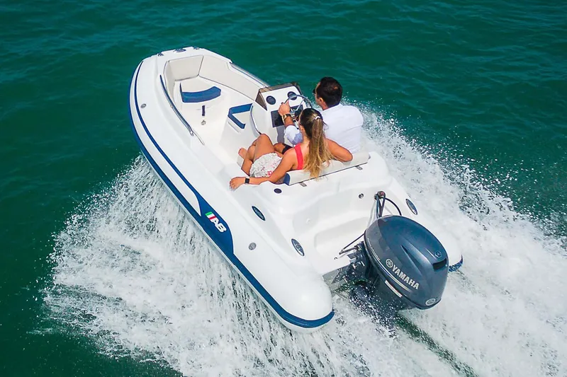 Slide: The Image of 2024 AB Inflatables Nautilus 12 DLX boat displayed in showroom. - 1