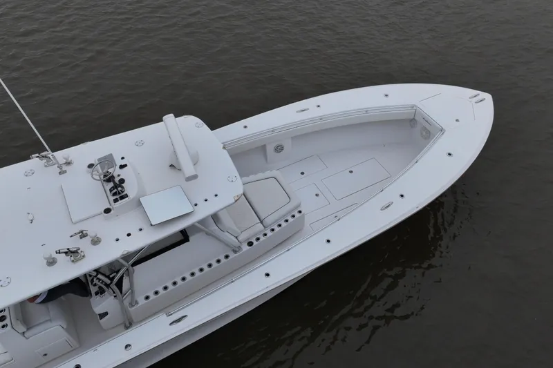Slide: The Image of 2015 SeaHunter 45 Tournament boat on calm water, aerial view. - 10