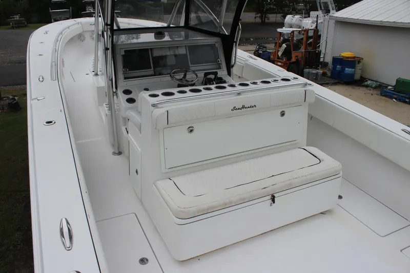 Slide: The Image of 2015 SeaHunter 45 Tournament boat interior with helm and seating area. - 14