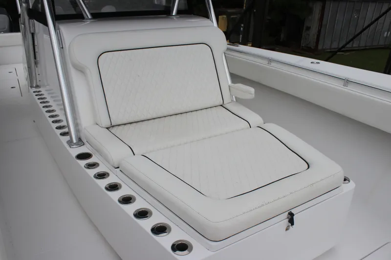 Slide: The Image of Luxurious seating on 2015 SeaHunter 45 Tournament boat, featuring white cushioned design. - 22