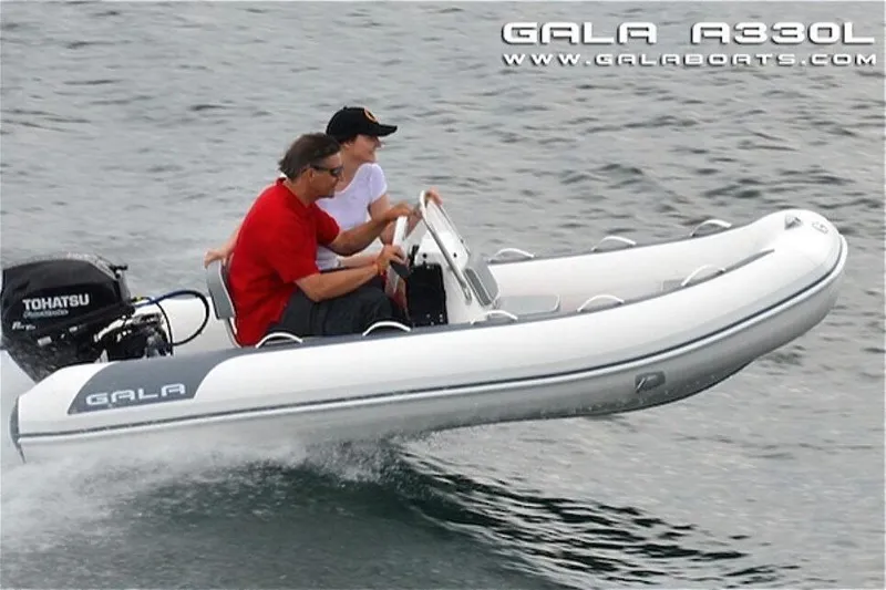 Slide: The Image of 2024 Gala A330HL boat with Yamaha 25HP engine on water. - 8