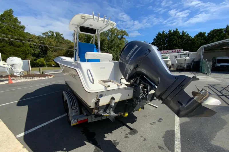 Slide: The Image of 2008 Sea Hunt Triton 220 boat with Yamaha outboard motor on trailer. - 8