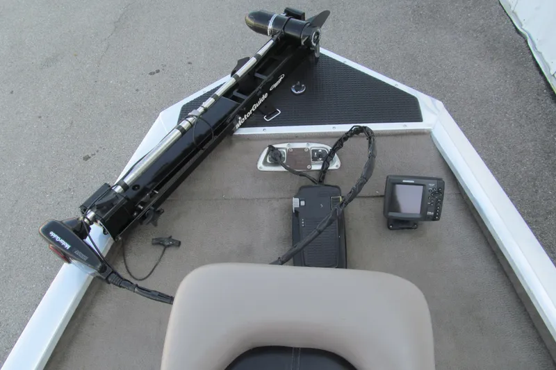 Slide: The Image of 2002 Tracker Pro Team 175 boat deck with trolling motor and fish finder. - 8