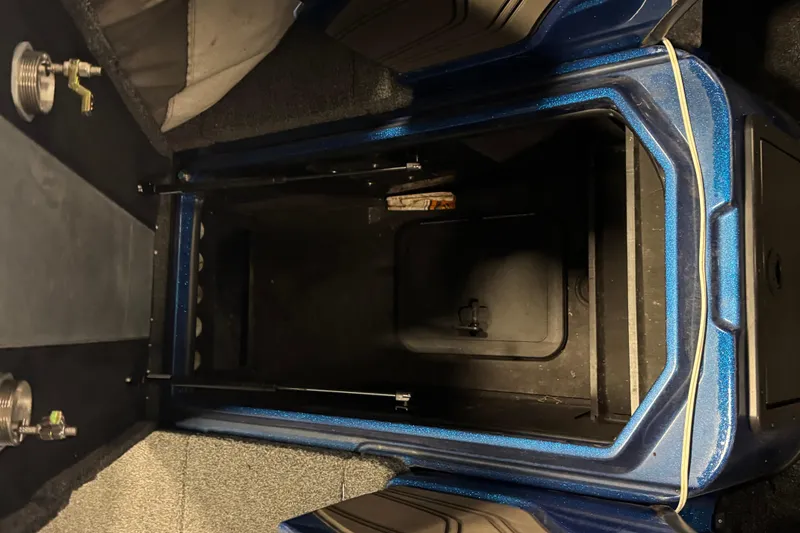 Slide: The Image of Interior storage compartment of a 2020 Nitro ZV20 Pro boat, featuring a spacious design. - 18