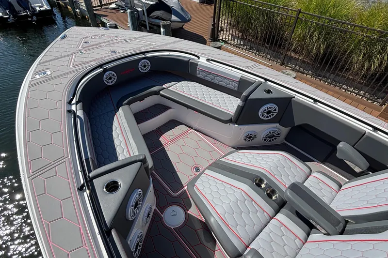 Slide: The Image of 2023 Fountain 34 SC boat interior with stylish seating and modern design. - 10