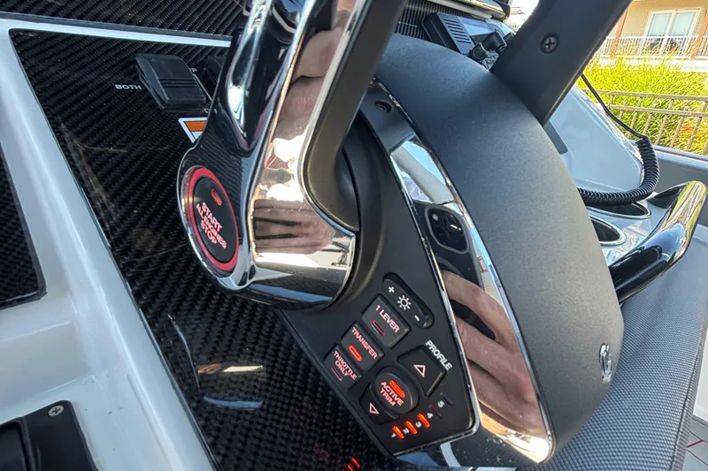 Slide: The Image of Control panel of 2023 Fountain 34 SC boat with sleek design and advanced features. - 24