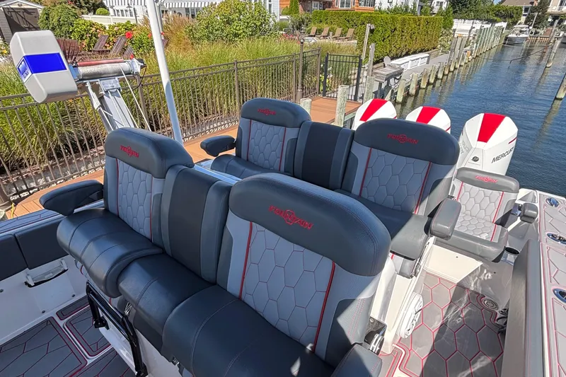 Slide: The Image of 2023 Fountain 34 SC boat interior with luxurious seating and modern design. - 29