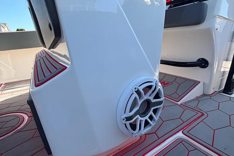 Slide: The Image of 2023 Fountain 34 SC boat interior with speaker and stylish flooring design. - 36