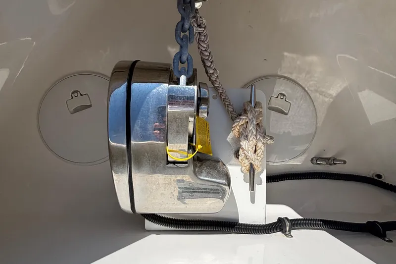 Slide: The Image of Anchor system on 2023 Fountain 34 SC boat, featuring chain and rope setup. - 53