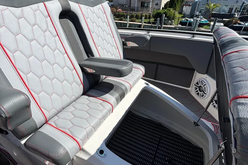 Slide: The Image of 2023 Fountain 34 SC boat interior with stylish seating and modern design. - 60