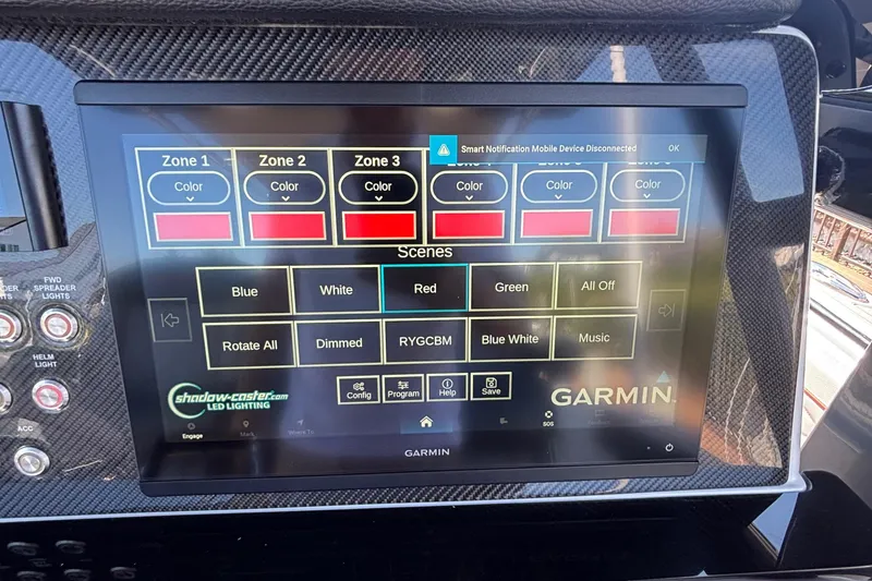 Slide: The Image of Garmin touchscreen on 2023 Fountain 34 SC boat, displaying LED lighting controls and color options. - 61