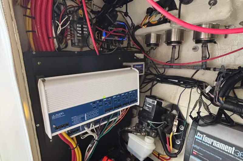 Slide: The Image of 2023 Fountain 34 SC boat electrical system with wiring and audio components. - 69