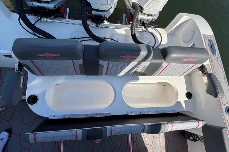 Slide: The Image of 2023 Fountain 34 SC boat seating with storage compartments and stylish upholstery. - 70