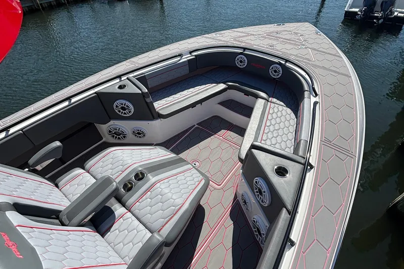 Slide: The Image of 2023 Fountain 34 SC boat interior with stylish seating and modern design. - 9