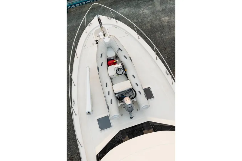 Slide: The Image of 2017 Maritimo M 51 yacht with inflatable boat on deck, viewed from above. - 10
