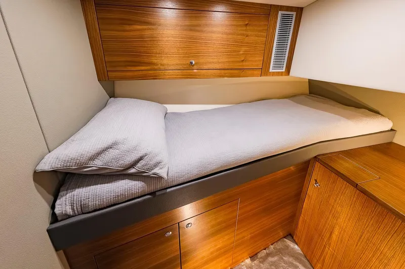 Slide: The Image of Luxurious cabin interior of 2017 Maritimo M 51 yacht with wooden cabinetry. - 28