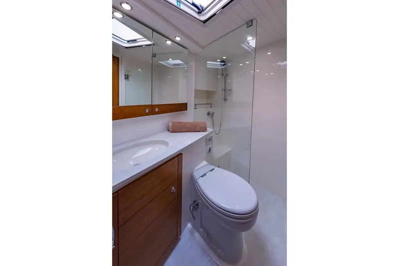 Slide: The Image of Luxurious bathroom in 2017 Maritimo M 51 yacht with modern fixtures and elegant design. - 29