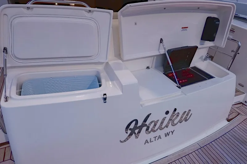 Slide: The Image of 2017 Maritimo M 51 yacht with open storage compartments on deck. - 36