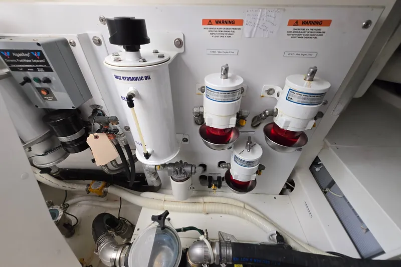 Slide: The Image of Engine room of 2017 Maritimo M 51 yacht with hydraulic oil and fuel filters. - 40