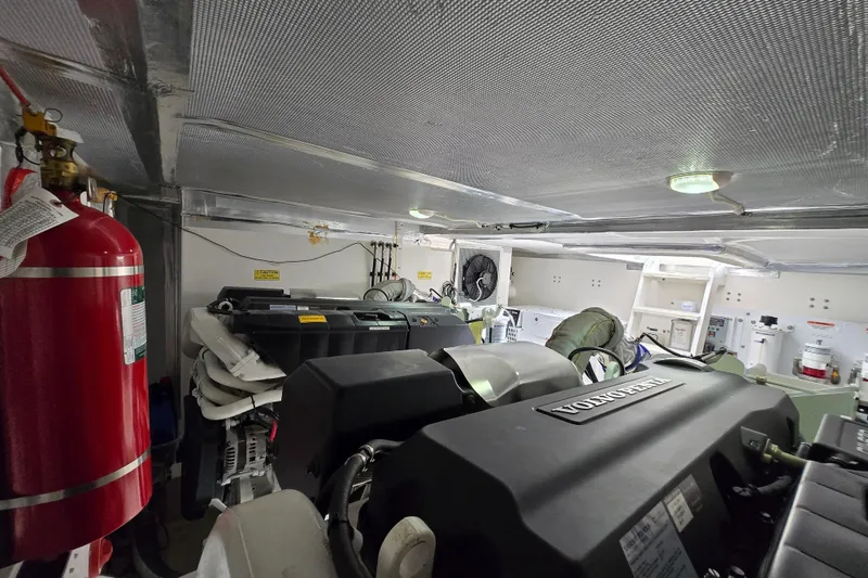 Slide: The Image of Engine room of 2017 Maritimo M 51 yacht with Volvo Penta engine and fire extinguisher. - 41