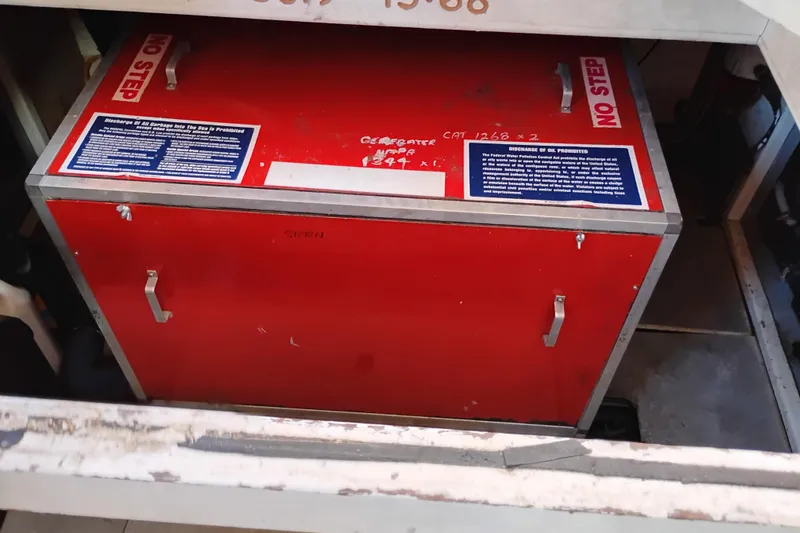 Slide: The Image of Red engine compartment in 1988 Monk 36 Aft Cabin boat, labeled "No Step." - 63