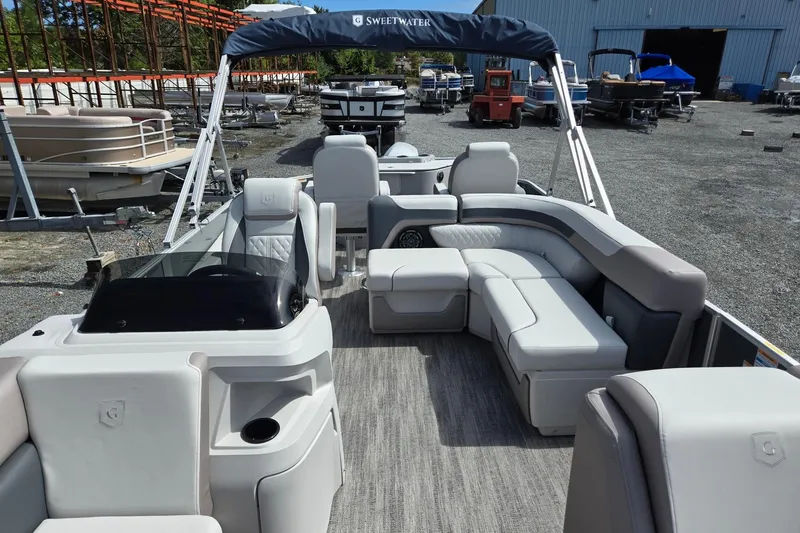 Slide: The Image of 2026 Godfrey Sweetwater 2286 FS pontoon boat with spacious seating and modern design. - 10
