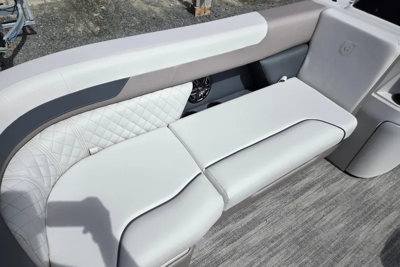 Slide: The Image of Luxurious seating on 2026 Godfrey Sweetwater 2286 FS boat, featuring elegant quilted upholstery. - 11