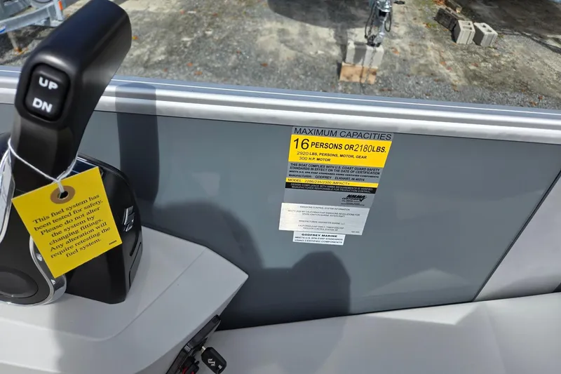 Slide: The Image of 2026 Godfrey Sweetwater 2286 FS boat capacity label, 16 persons or 2180 lbs. - 20