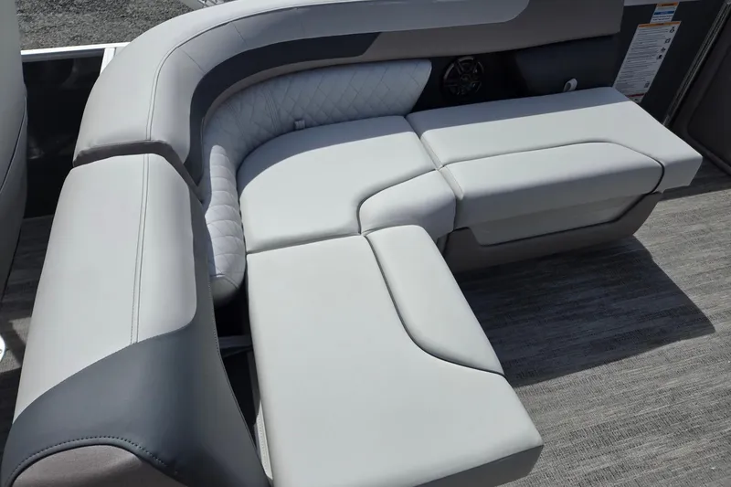 Slide: The Image of 2026 Godfrey Sweetwater 2286 FS boat interior with luxurious gray seating. - 37