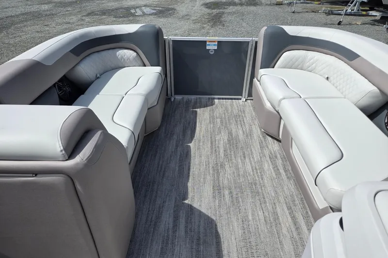 Slide: The Image of Interior view of 2026 Godfrey Sweetwater 2286 FS pontoon boat with plush seating. - 39