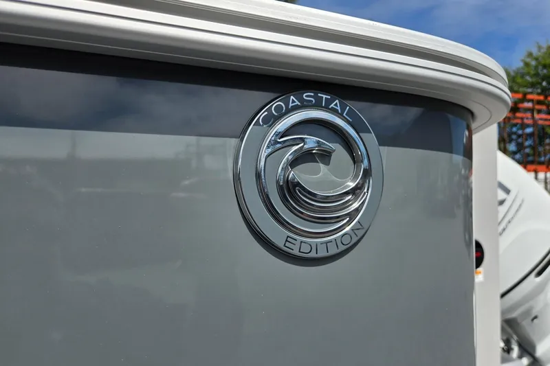 Slide: The Image of 2026 Godfrey Sweetwater 2286 FS Coastal Edition emblem on sleek boat exterior. - 47