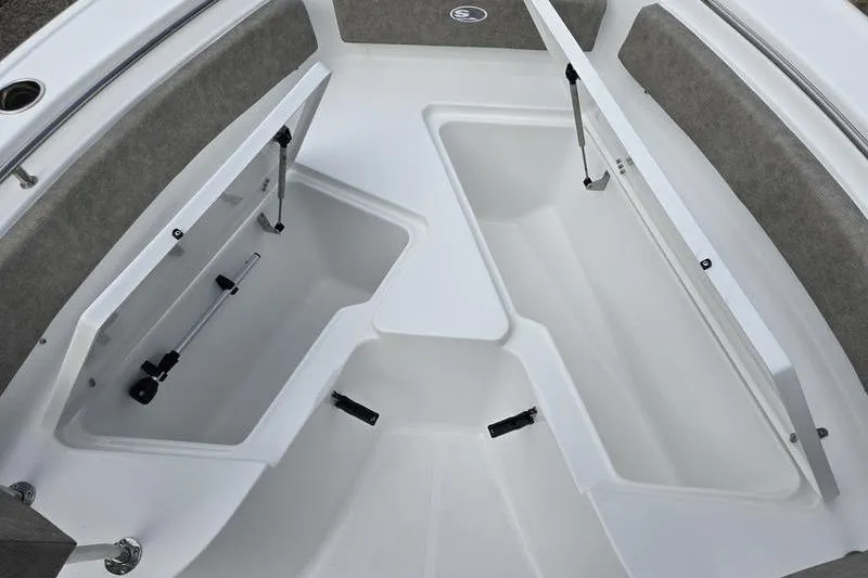 Slide: The Image of 2026 Sea Hunt Ultra 229 boat storage compartments, open and spacious design. - 11