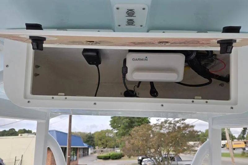 Slide: The Image of 2026 Sea Hunt Ultra 229 boat console with Garmin electronics and wiring. - 14