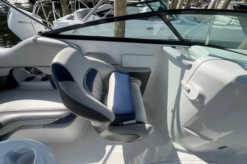 Slide: The Image of Interior of a 2021 Hurricane SD 2486 boat, featuring sleek seating and modern design. - 19