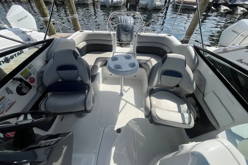 Slide: The Image of Interior of a 2021 Hurricane SD 2486 boat with seating and table. - 28