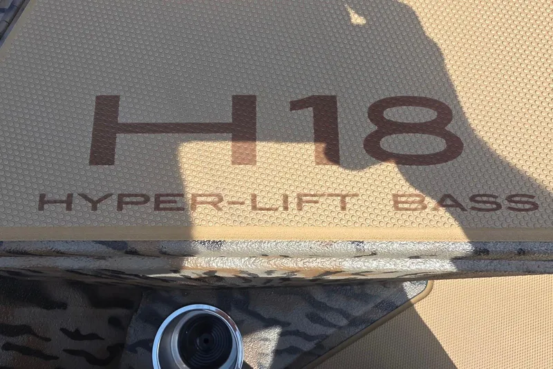 Slide: The Image of 2026 Xpress H18 Bass boat deck with "Hyper-Lift Bass" branding. - 16