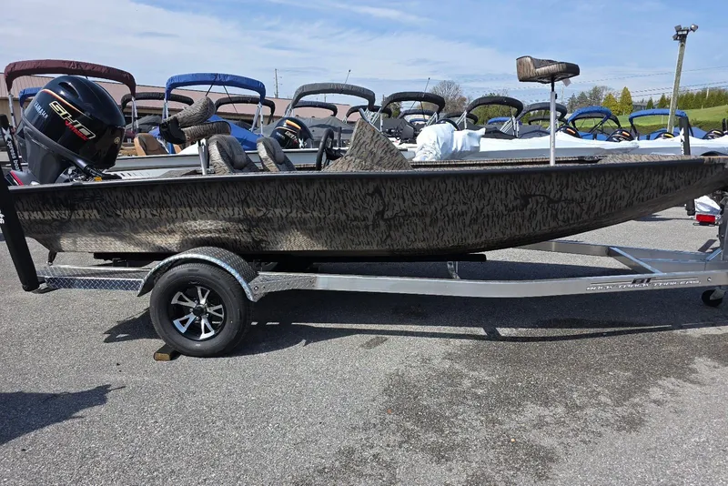 The Image of 2026 Xpress H18 Bass boat on trailer, featuring Yamaha outboard motor. - 8