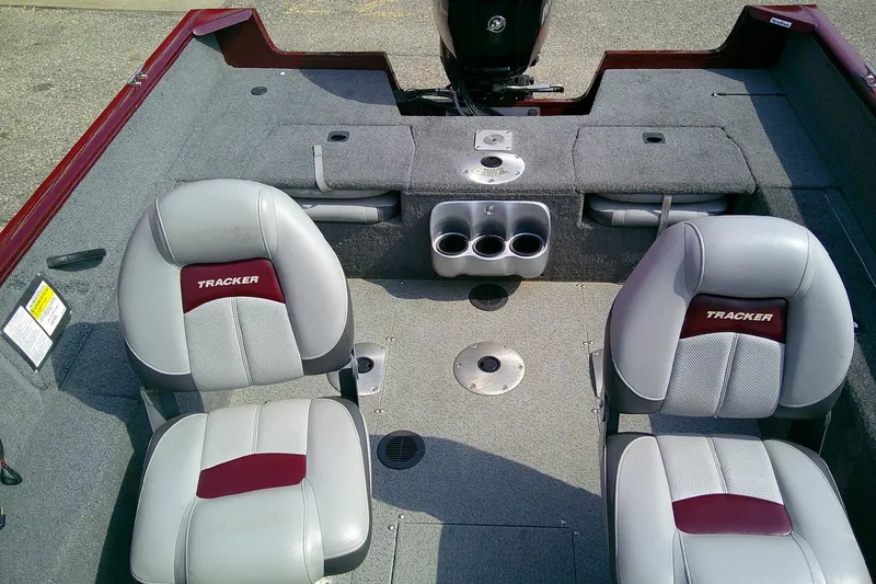 Slide: The Image of 2016 Tracker Pro Guide V-175 Combo boat interior with seating and storage compartments. - 7