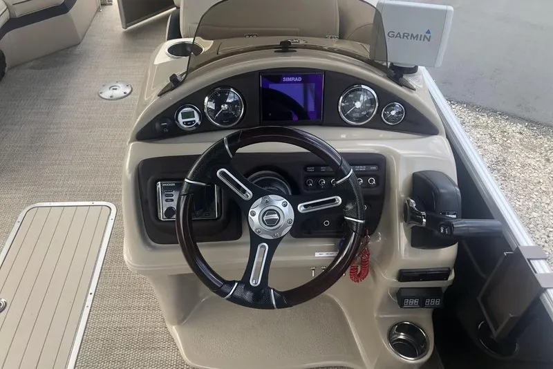 Slide: The Image of 2018 South Bay 822 CR boat dashboard with Garmin navigation and Simrad display. - 8