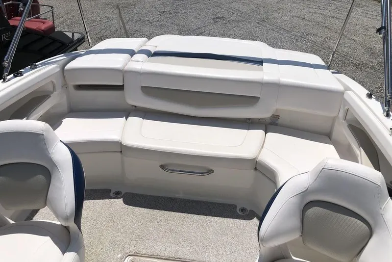 Slide: The Image of 2011 Chaparral 206 SSi boat interior with white seating and spacious layout. - 5