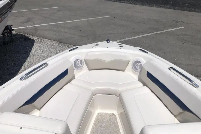 Slide: The Image of 2011 Chaparral 206 SSi boat interior with white seating and blue accents. - 8