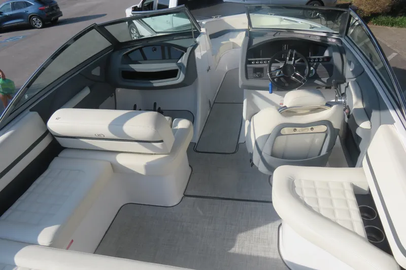 Slide: The Image of 2020 Cobalt R3 Surf boat interior with luxurious seating and modern dashboard design. - 6