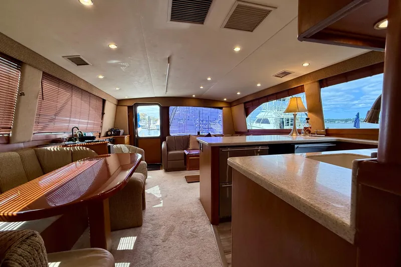 Slide: The Image of Luxurious interior of 2000 Ocean Yachts 48, featuring elegant seating and modern amenities. - 3