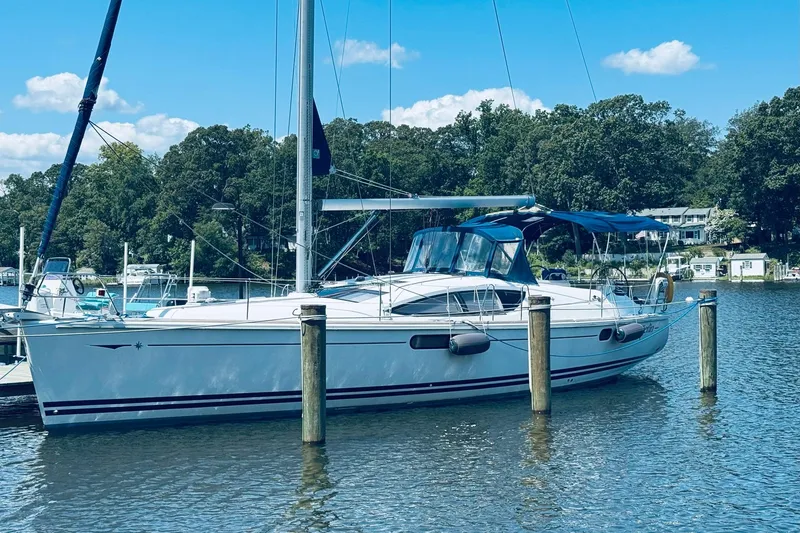The Image of 2008 Jeanneau Sun Odyssey 45 DS sailboat docked on a sunny day. - 0
