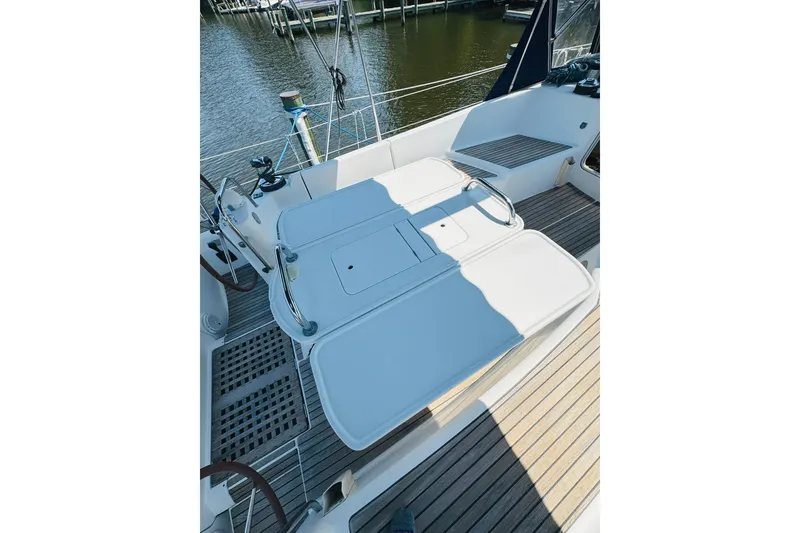 Slide: The Image of Cockpit of 2008 Jeanneau Sun Odyssey 45 DS sailboat with teak flooring and seating. - 15
