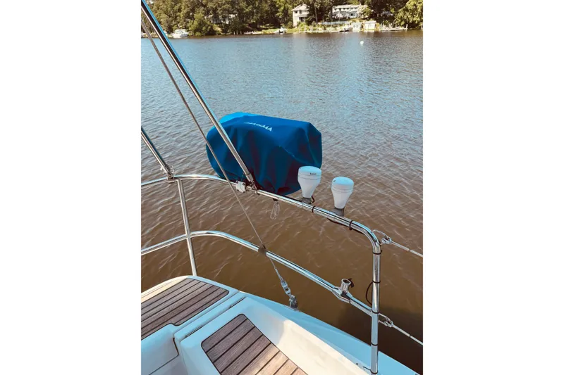 Slide: The Image of Jeanneau Sun Odyssey 45 DS sailboat deck overlooking calm waters, 2008 model. - 21